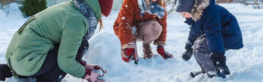 kids playing in the snow