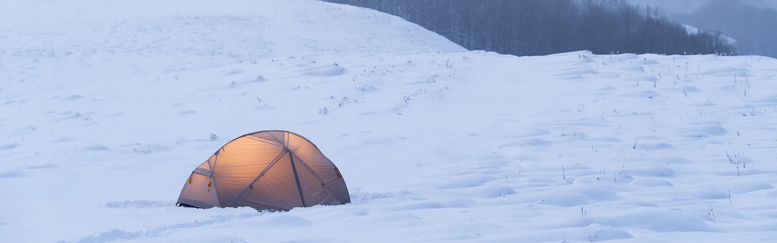 tent on the mountain in the winter